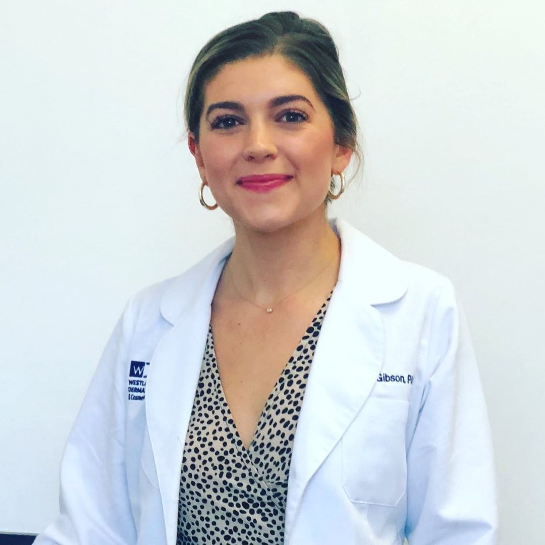 Natalie Gibson in a white clinical coat